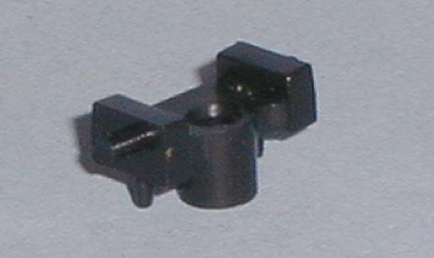 Scalextric mounting for guide blade assembly